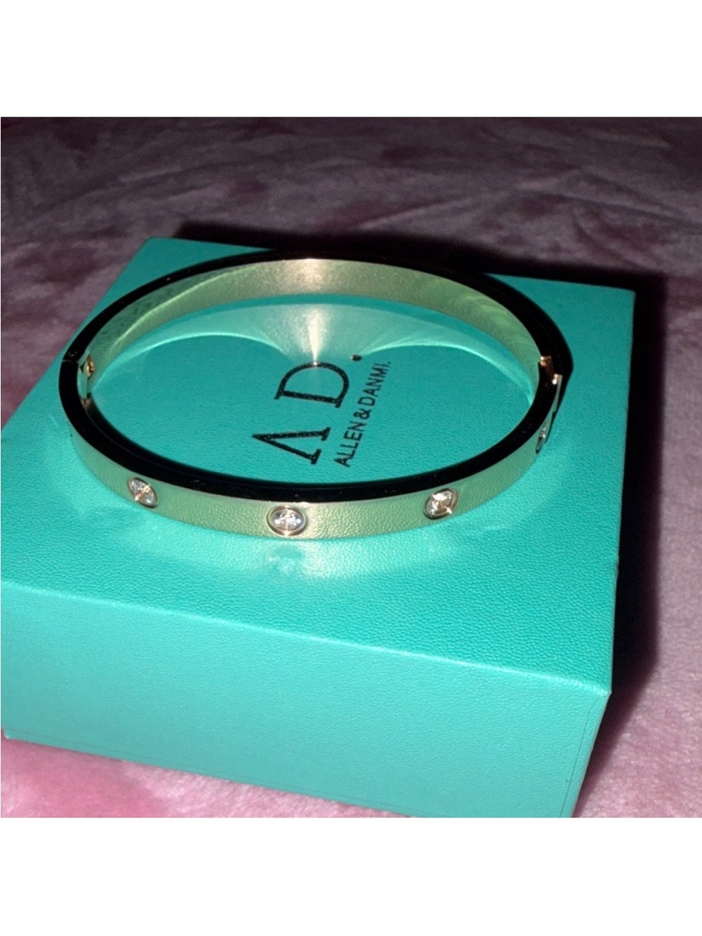 A D gold plated bracelet with CZ stones